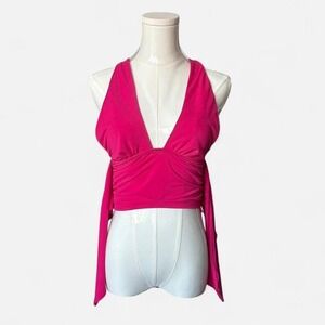 Hot pink Urban Outfitters jersey crop top with tie back #festivalvibes